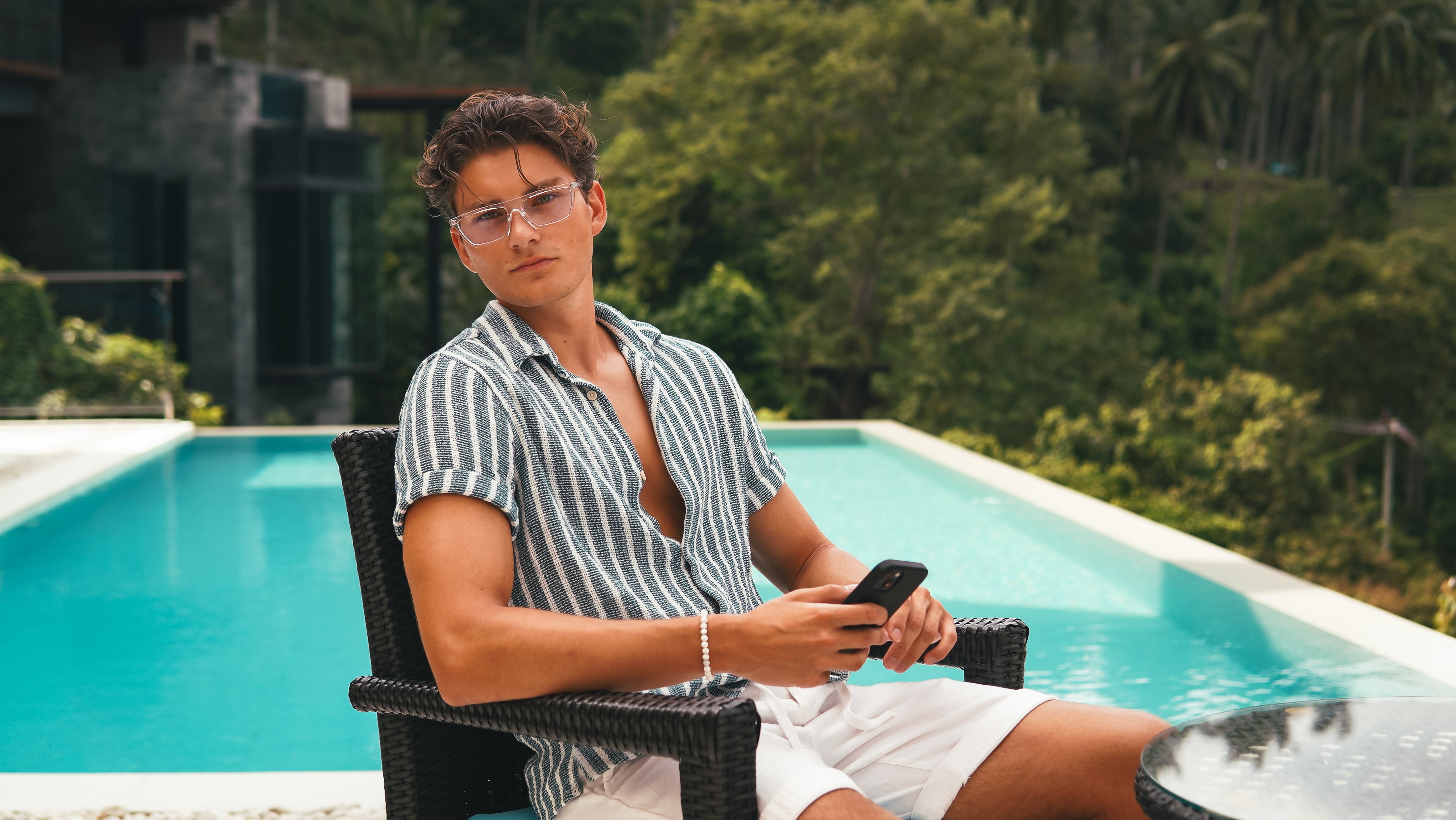 A man is wearing Havoc at the swimming pool