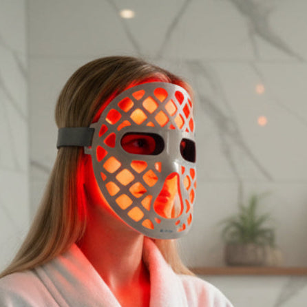 woman wearing emr-tek eterno red light therapy mask