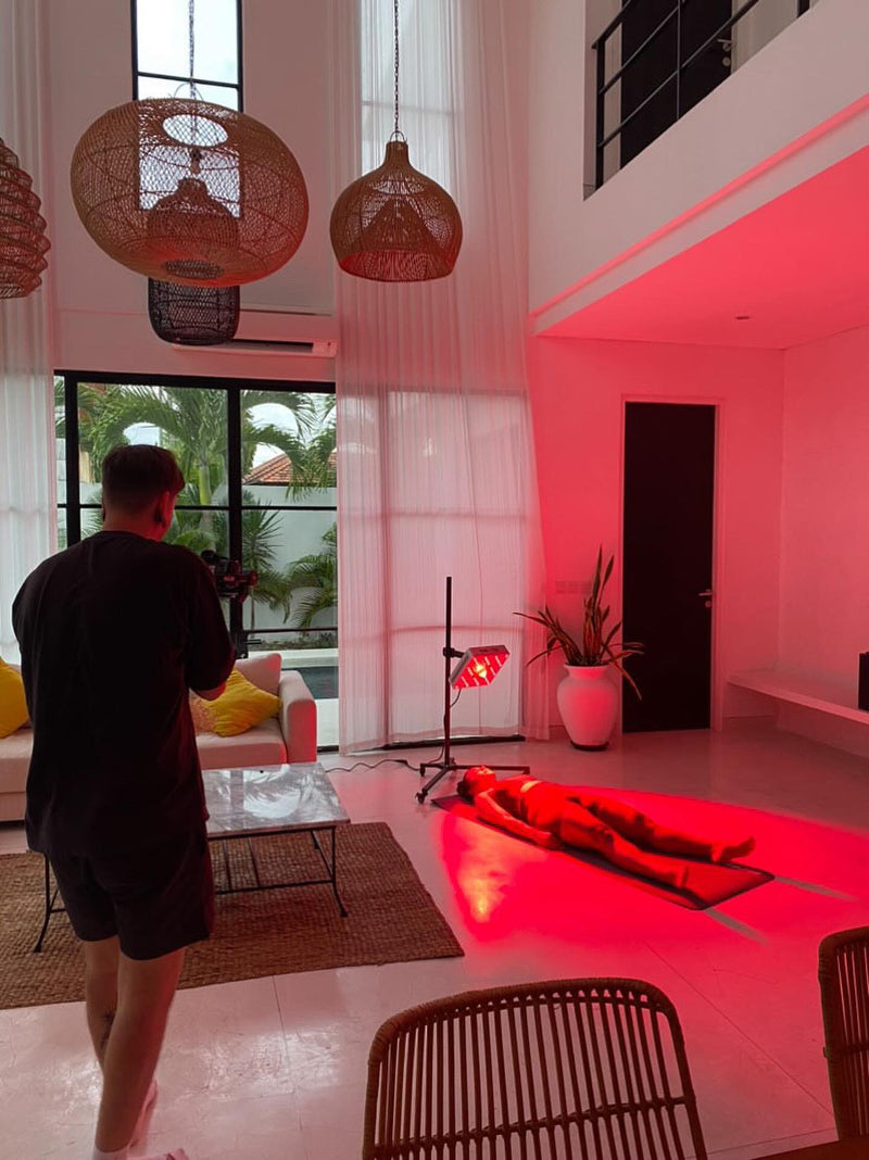 a man is using EMR-TEK product Light stand 