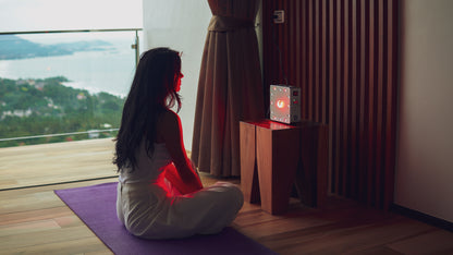 A woman is using EMR-TEK Firewave 