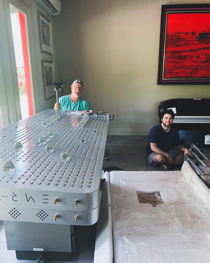 two people in this image packing the firehawk for delivery 